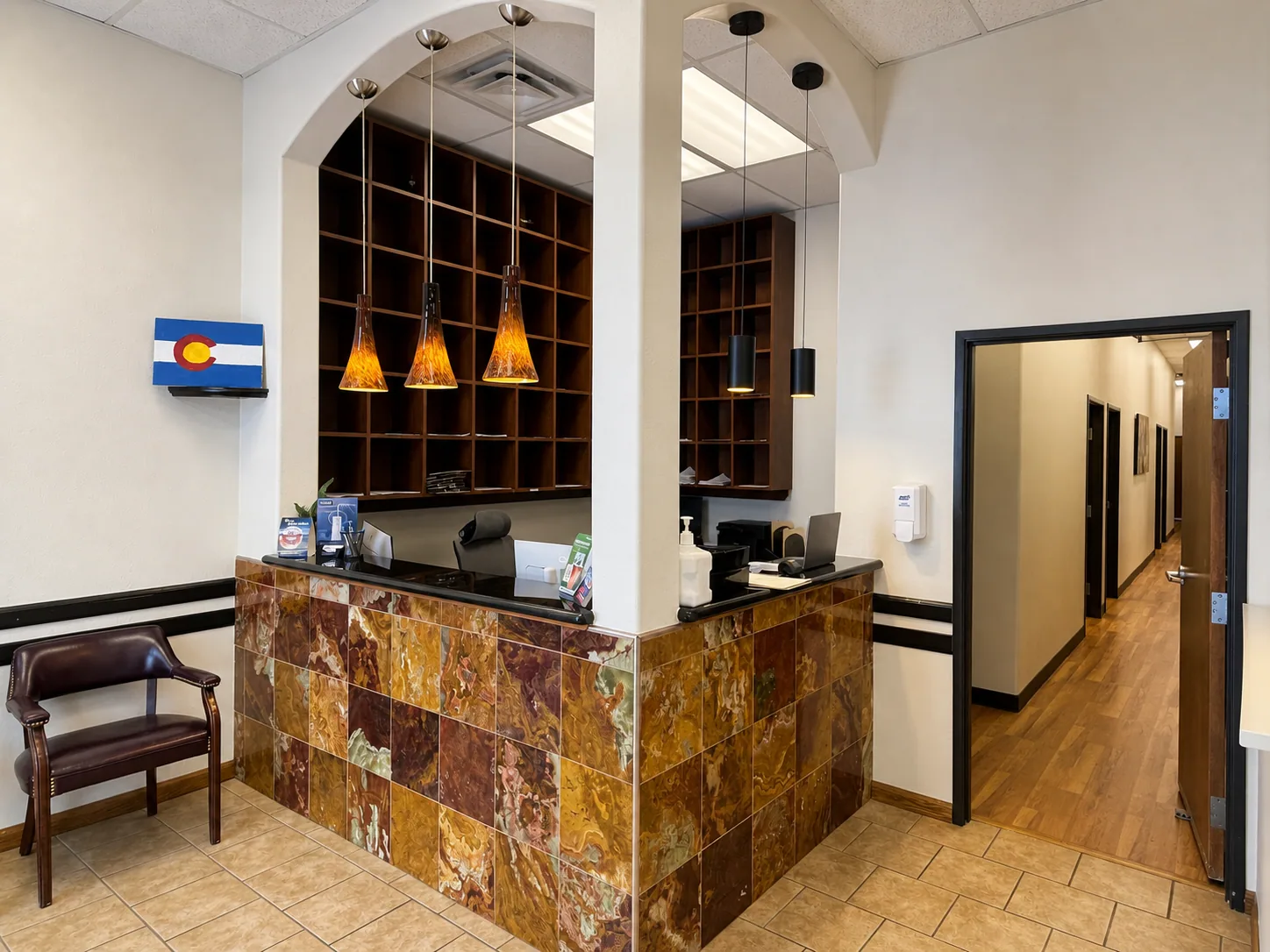 Reception desk and hallway inside Star Dental's Denver office