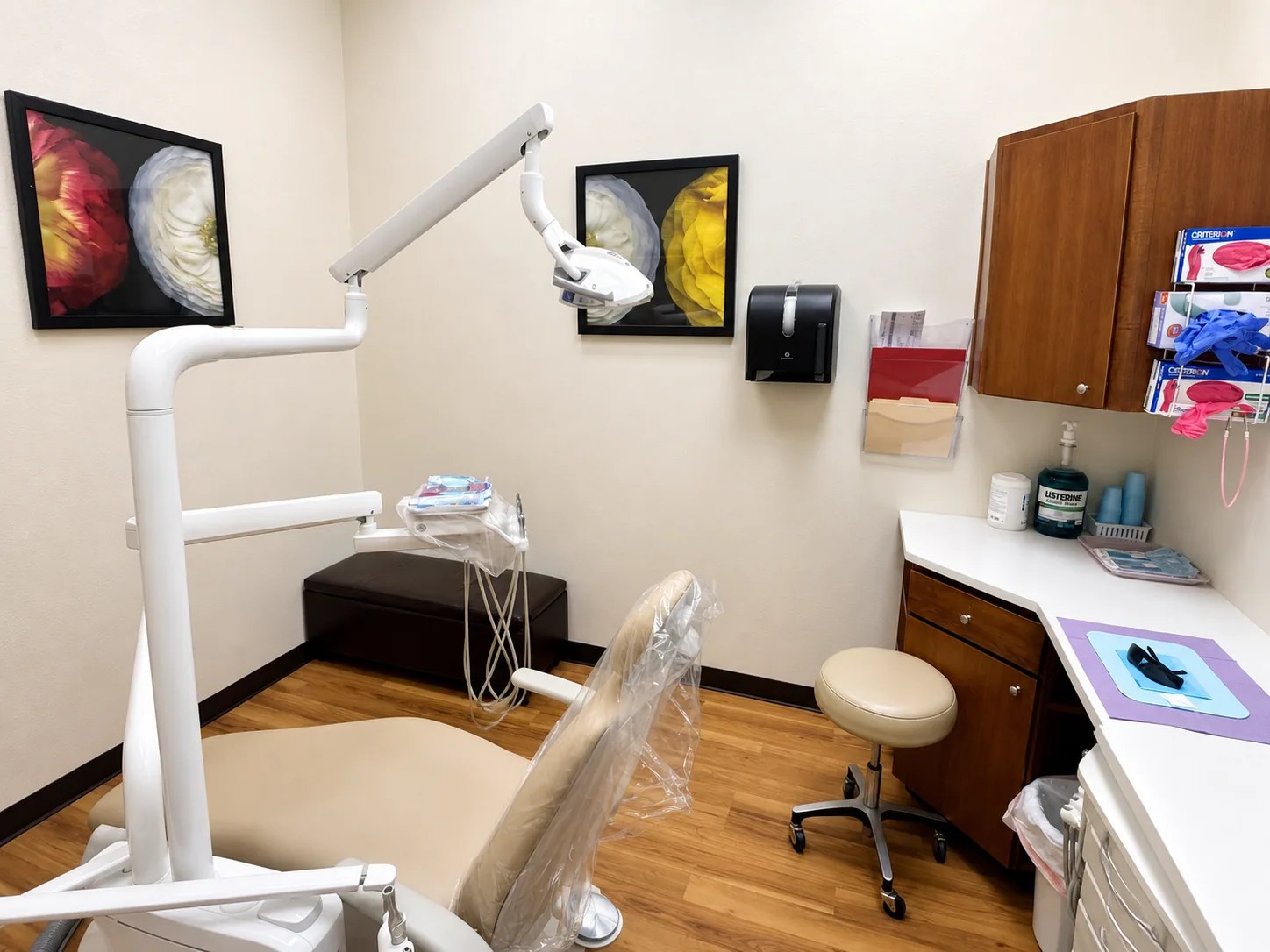 Dental treatment room with chair and exam light at Star Dental in Denver
