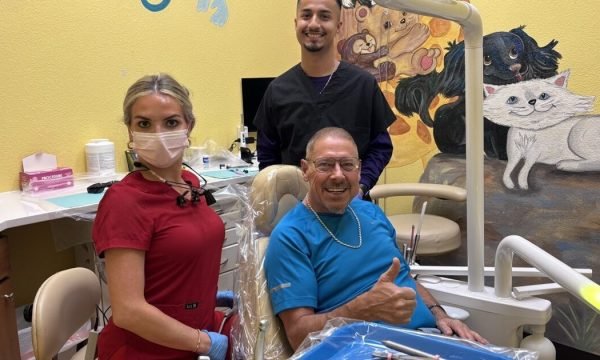 Star Dental team with an adult patient in a Denver treatment room